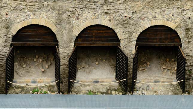 Three of 12 boat chambers at Herculaneum, with skeletons inside.