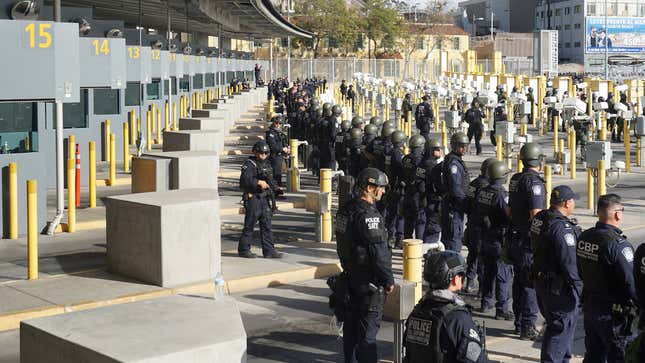 CBP officers from the Office of Field Operations and agents from the U.S. Border Patrol and Air and Marine Operations run exercises at the U.S-Mexico border at the San Ysidro Port of Entry on November 22, 2018