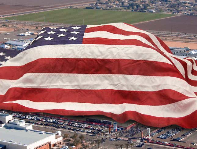 Image for article titled Giant American Flag Draped Over Entire Stadium During National Anthem