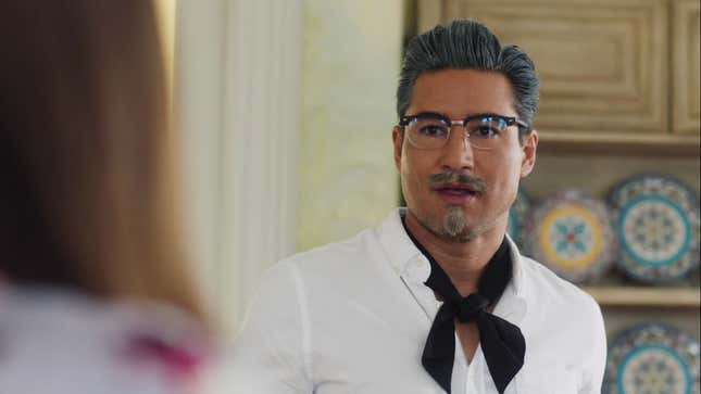 Mario Lopez as Harland Sanders, looking shocked to see Jessica