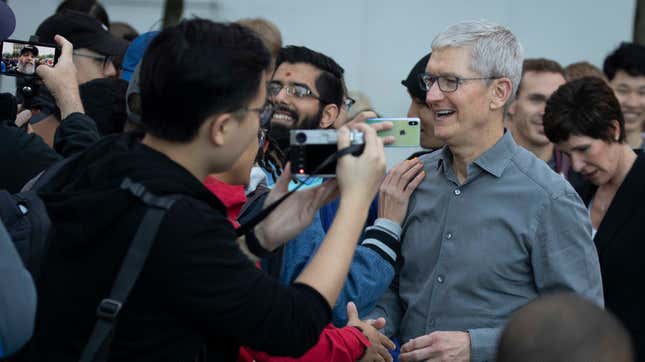 Apple CEO Tim Cook greets customers as they wait in line to purchase the new iPhone 11 at Apple’s flagship 5th Avenue store on September 20, 2019 in New York City.