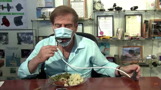 Image for article titled Now there’s a face mask with a mouth hole for eating. What could go wrong?