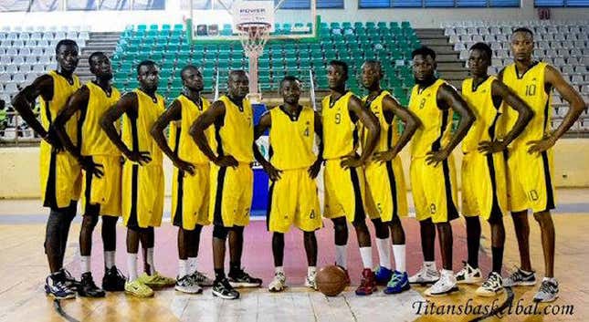 Jimmy Sorunke, far left, poses with the Ogun Pacers of the NBBF, a Nigerian professional league, before a national tournament in 2016.