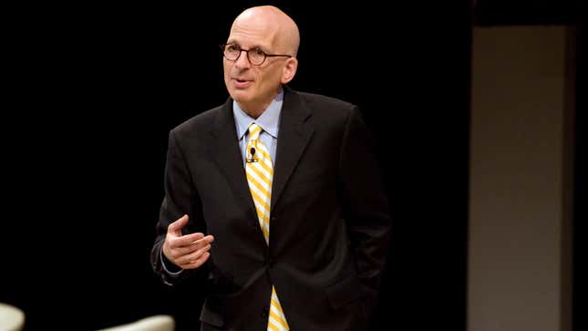 Seth Godin, whose talk is as smooth as his head, speaking at the 99 Percent Conference