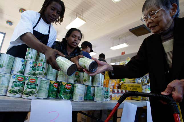 Food supplied by the San Francisco Food Bank for Thanksgiving dinners is distributed by volunteers at a neighborhood food pantry November 20, 2007 in San Francisco, California.