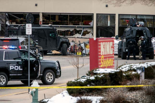 Smashed windows are left at the scene after a gunman opened fire at a King Sooper’s grocery store on March 22, 2021 in Boulder, Colorado. Ten people, including a police officer, were killed in the attack. (Photo by Chet Strange/Getty Images)