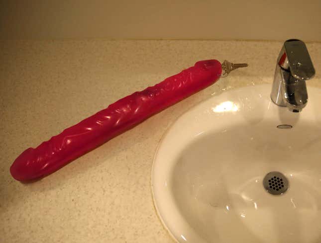 Image for article titled Sex Shop Bathroom Key Attached To 18-Inch Double Dildo