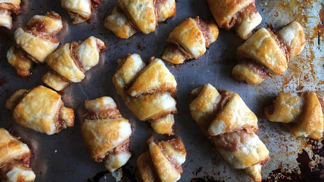 Aerial view of a sheet pan full of peanut butter and jelly rugelach