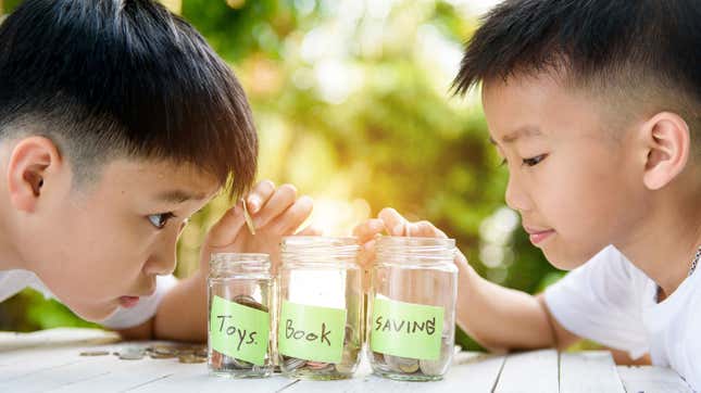 Image for article titled An Age-By-Age Guide to Teaching Kids About Money