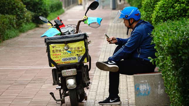 Image for article titled Chinese food delivery companies experiment with contactless service