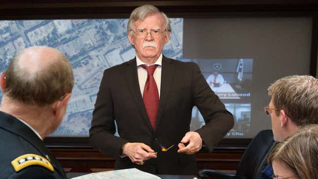 Image for article titled Aides Request John Bolton Please Stop Setting Fire To Middle East Tactical Map