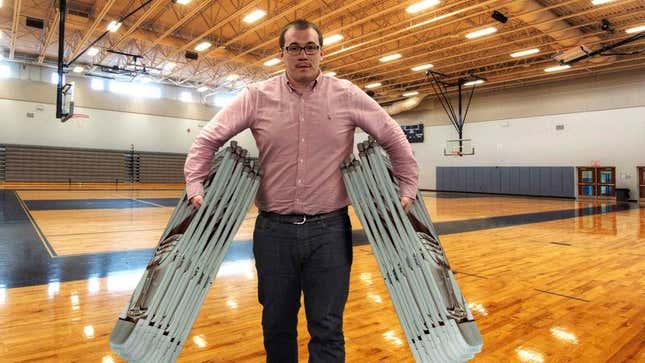 Image for article titled Man Hoping People Notice How Many Folding Chairs He’s Carrying At Once