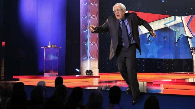 Image for article titled Out-Of-Control Hand Gesture Sends Bernie Sanders Tumbling Off Stage