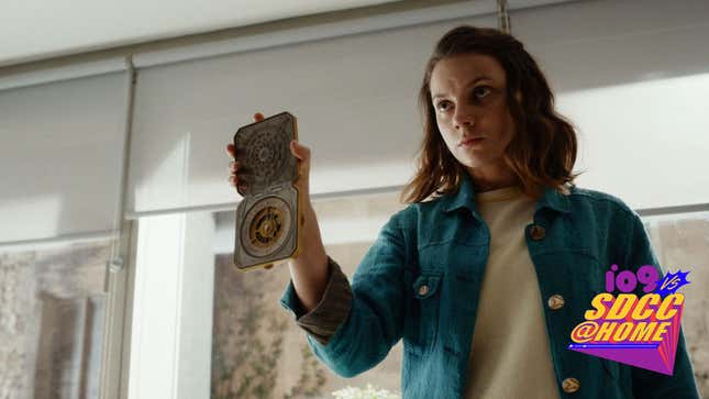 Lyra (Dafne Keen) shows the alethiometer at the center of it all. 