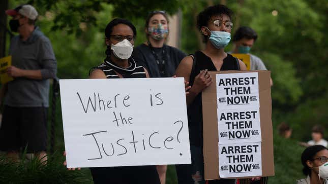 A group of protesters gather outside the home of Hennepin County Attorney Mike Freeman on May 28, 2020 in Minneapolis, Minnesota. 
