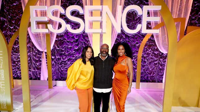 Essence CEO Michelle Ebanks, Essence Ventures Founder &amp; Chairman Richelieu Dennis, and Essence Chief Content &amp; Creative Officer Moana Luu pose onstage during the 2020 13th Annual ESSENCE Black Women in Hollywood Luncheon on February 06, 2020 in Beverly Hills, California.