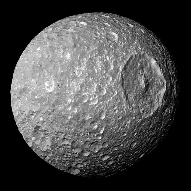 In this view captured by NASA’s Cassini spacecraft on its closest-ever flyby of Saturn’s moon Mimas, large Herschel Crater dominates Mimas, making the moon look like the Death Star in the movie “Star Wars.”