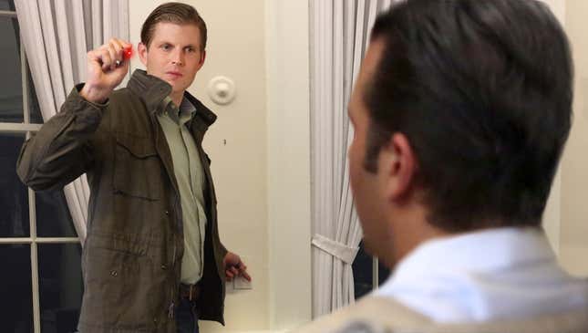 Image for article titled Eric Trump Aims Laser Pointer At Don Jr. While Flicking Lights On And Off To Erase Memory Of Russia Meeting