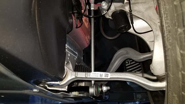 Toyota Supra double-joint spring strut front suspension as viewed from the rear