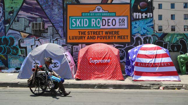 In May 2019, British artist Chemical X’s art installation “Skid Rodeo Drive” highlighted the economic disparities in Los Angeles, where scores of homeless people live in tent communities not far from luxe enclaves like the famed Rodeo Drive. In the L.A. suburb of Pacoima, Calif., dozens of predominantly African-American people are living in tents under the Ronald Reagan Freeway.