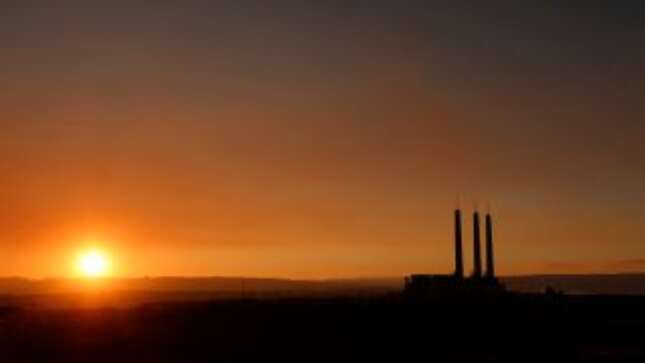 The sun sets on the Navajo Generating Station.