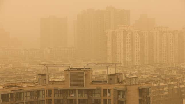 BEIJING, CHINA - MARCH 15: Buildings are seen during a sandstorm on March 15, 2021 in Beijing, China. 