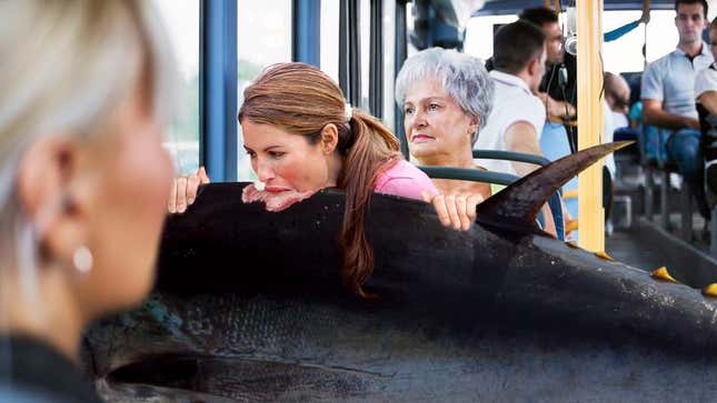 Image for article titled Inconsiderate Woman On Bus Eating Live Tuna