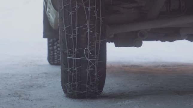 Image for article titled Our Favorite Russians Attempt To Make Studded Tires Using Barbed Wire