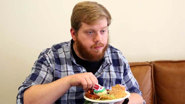 Image for article titled Area Man Totally Screwing Up Order Of Snack Consumption During Super Bowl Party