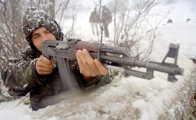 A soldier with the ethnic Albanian UCPMB, or Liberation Army of Presevo, Medvedja and Bujanovac, guards his positions on the front February 23, 2001 near the village of Shoshaj, Serbia, Yugoslavia.