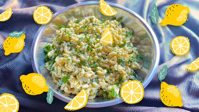 Photo of garlic lemon herb pasta salad with green curly parsley, surrounded by illustrated lemons