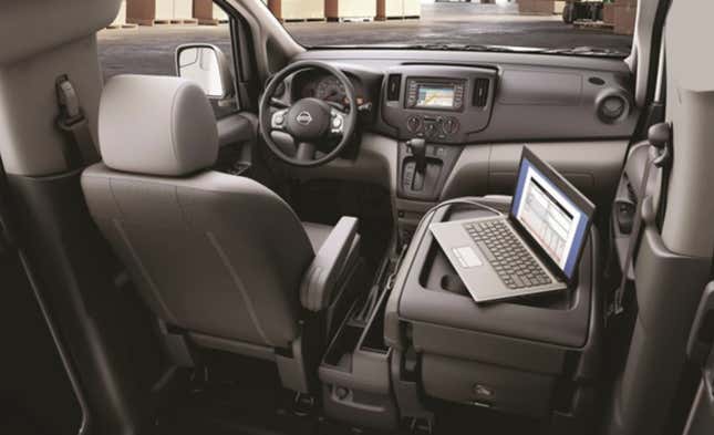 Imagen para el artículo titulado Ford ofrecía esta mesa de trabajo para el conductor en 1990, y es simplemente increíble