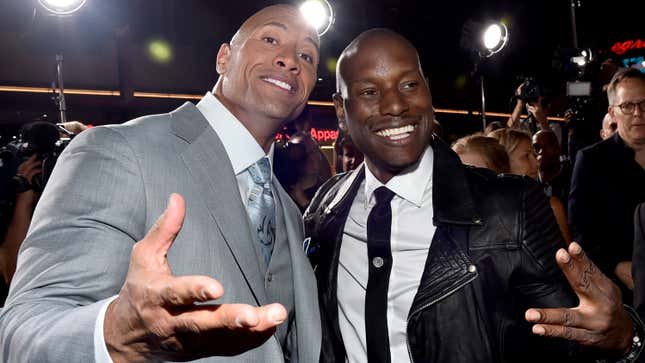 Dwayne ‘The Rock’ Johnson (L) and recording artist/actor Tyrese Gibson attend Universal Pictures’ “Furious 7&quot; premiere at TCL Chinese Theatre in Hollywood, California.
