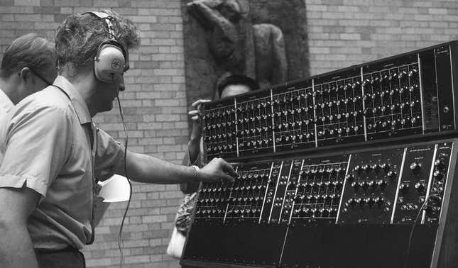 Robert Moog tweaks his famous Moog Synthesizer in 1969