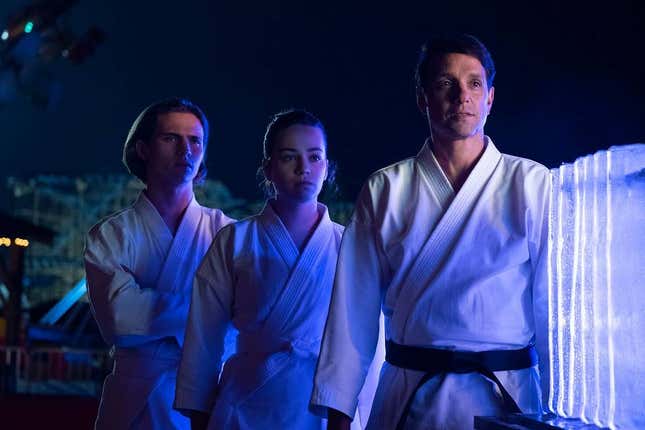 Robby (Tanner Buchanan) and Sam (Mary Mouser) are Daniel’s (Ralph Macchio) new pupils in Cobra Kai season two.