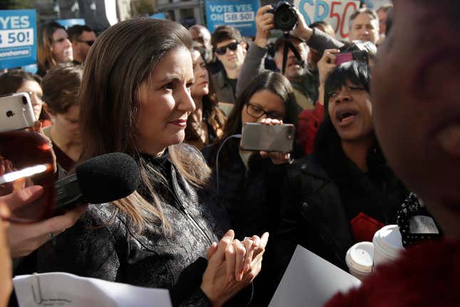 Oakland Mayor Libby Schaaf talks with women from the group Moms 4  Housing outside of City Hall in Oakland, Calif. on Jan. 7, 2020.