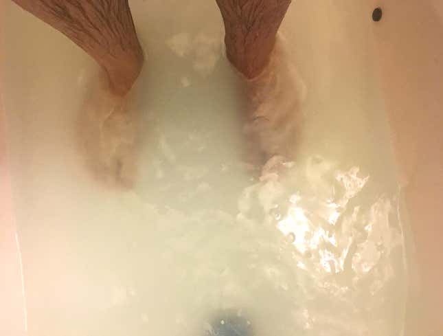 Image for article titled Man With Backed-Up Shower Drain Enjoys Luxurious Foot Soak