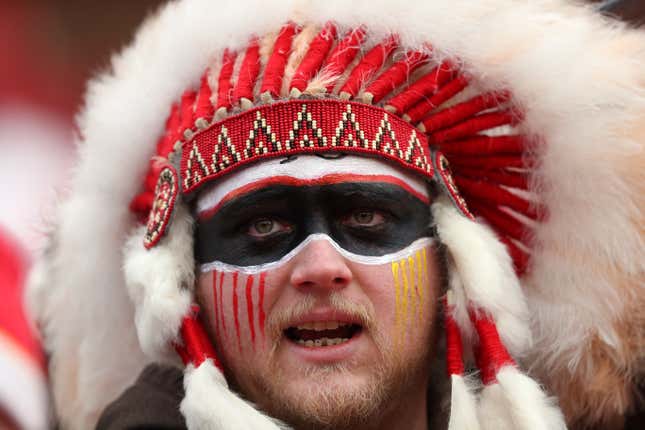 A fan in a headdress looks on prior to the AFC Divisional playoff game between the Kansas City Chiefs and the Houston Texans at Arrowhead Stadium on January 12, 2020 in Kansas City, Missouri. 