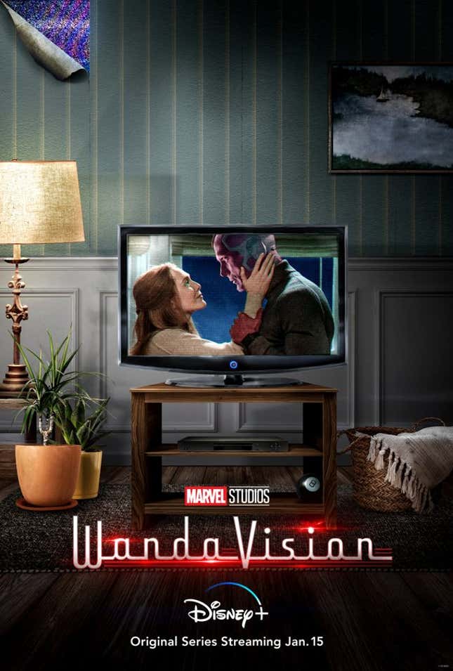 Wanda and Vision embracing one another as something green glows in Wanda’s eyes.
