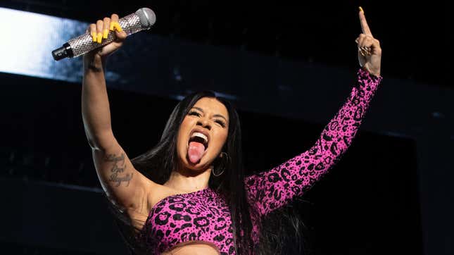 Cardi B sticks her tongue out onstage