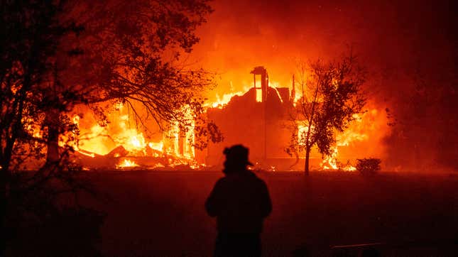  A home burns in Vacaville, California, during the LNU Lightning Complex fire on August 19, 2020.