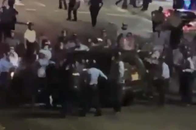 Image for article titled Video Shows Philadelphia Police Smash SUV Window With Child in Back Seat During Walter Wallace Unrest
