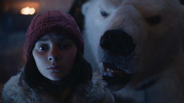 Lyra (Dafne Keen) has a tense showdown with a giant bear.