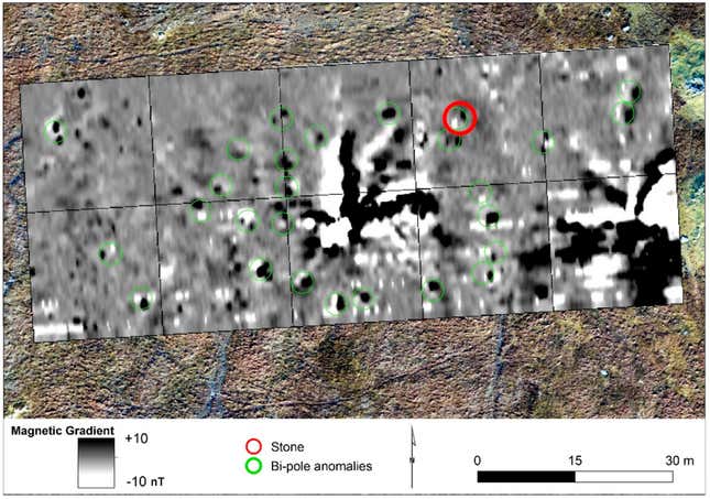The magnetic anomaly, or magnetic gradient, appears as a large star-shaped structure. The green circles show the previous locations of other standing stones, and the red circle shows the lone standing stone.