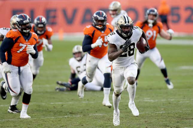 Latavius Murray #28 of the New Orleans Saints rushes for a 36 yard touchdown during the third quarter of a game against the Denver Broncos at Empower Field At Mile High on November 29, 2020 in Denver, Colorado.