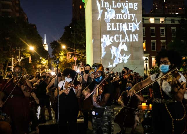 String players perform during a violin vigil for Elijah McClain in Washington Square Park on June 29, 2020, in New York City. McClain was a 23-year-old African American man who died while in police custody after he was stopped while walking home in Aurora, Colorado last August. 