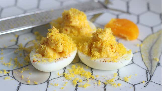 Image for article titled Bless Your Deviled Eggs With Grated Cured Yolks