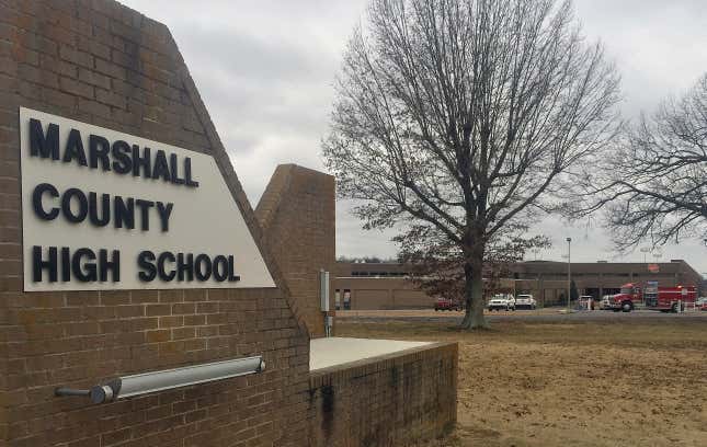 Authorities at the scene of the fatal school shooting on Tuesday, Jan 23, 2018, in Benton, KY.