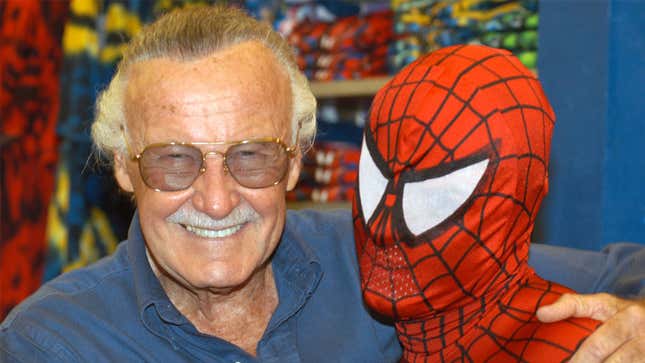 Stan Lee poses with Spider-Man during the Spider-Man 40th birthday celebration at Universal Studios. 