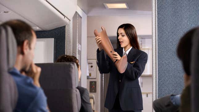 Image for article titled Flight Attendant Demonstrates Proper Technique For Eating Fellow Passenger In Event Of Crash